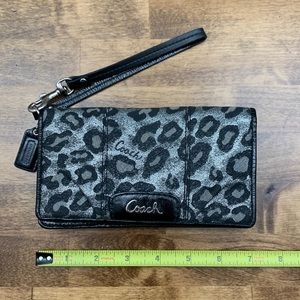 Coach ocelot print wristlet wallet